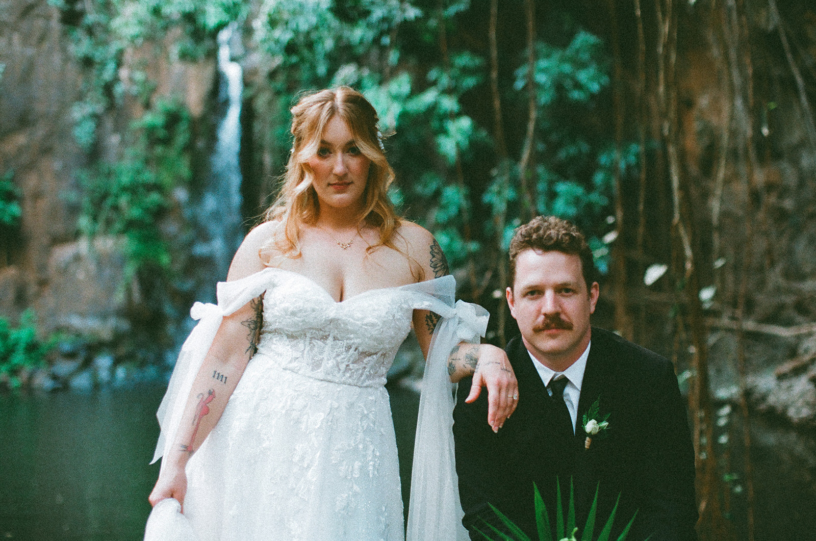 Some elopements feel like they were pulled straight out of a dream, and Courtnee and Joshua’s waterfall elopement in Kauai, Hawaii was exactly that. Surrounded by lush jungle, the sound of rushing water, and the soft island breeze, their day was intentional, intimate, and centered completely around the two of them.