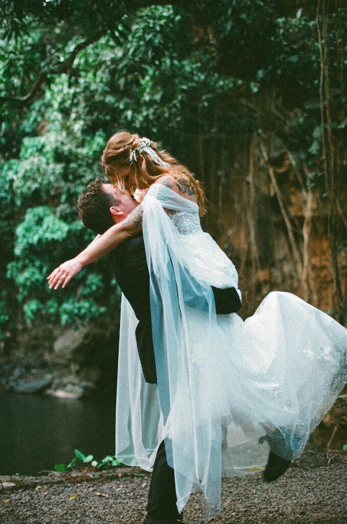 Some elopements feel like they were pulled straight out of a dream, and Courtnee and Joshua’s waterfall elopement in Kauai, Hawaii was exactly that. Surrounded by lush jungle, the sound of rushing water, and the soft island breeze, their day was intentional, intimate, and centered completely around the two of them.