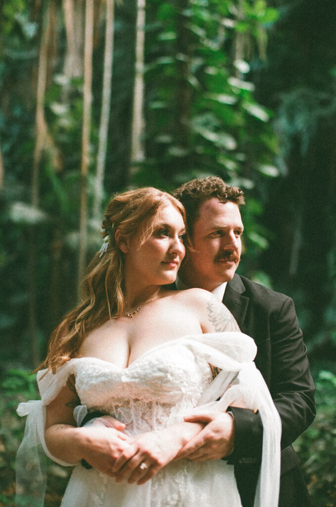 Some elopements feel like they were pulled straight out of a dream, and Courtnee and Joshua’s waterfall elopement in Kauai, Hawaii was exactly that. Surrounded by lush jungle, the sound of rushing water, and the soft island breeze, their day was intentional, intimate, and centered completely around the two of them.