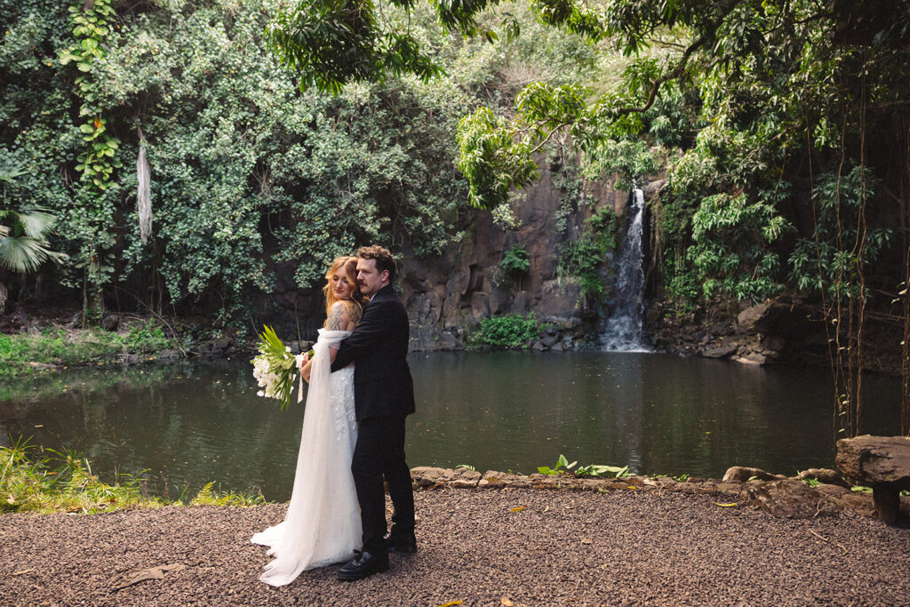 Some elopements feel like they were pulled straight out of a dream, and Courtnee and Joshua’s waterfall elopement in Kauai, Hawaii was exactly that. Surrounded by lush jungle, the sound of rushing water, and the soft island breeze, their day was intentional, intimate, and centered completely around the two of them.
