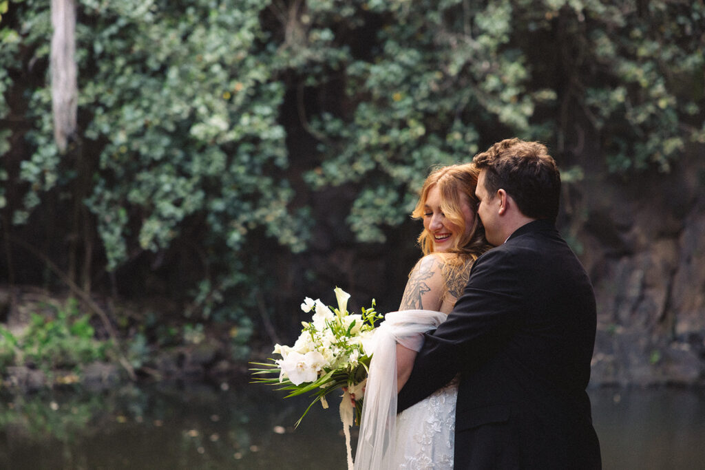 Some elopements feel like they were pulled straight out of a dream, and Courtnee and Joshua’s waterfall elopement in Kauai, Hawaii was exactly that. Surrounded by lush jungle, the sound of rushing water, and the soft island breeze, their day was intentional, intimate, and centered completely around the two of them.