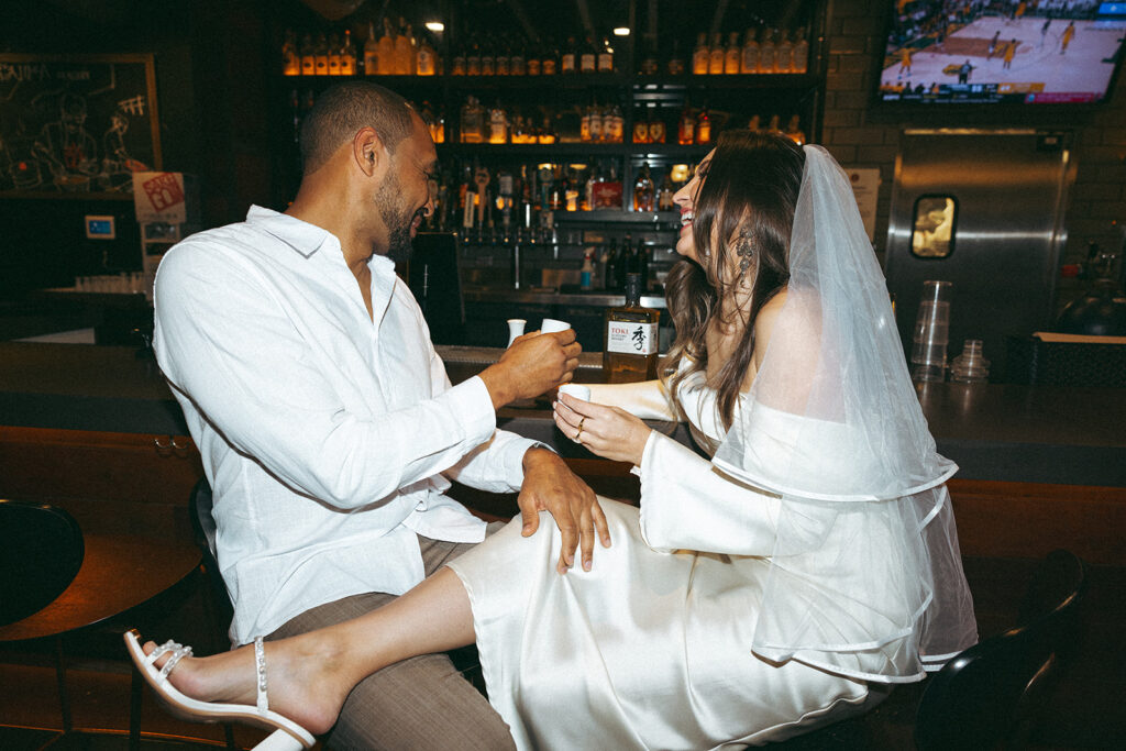 Katie and Karl’s late-night San Diego engagement session was absolutely the latter. These two showed up ready for fun, dressed to the nines, and totally embracing that after-dark, moody, editorial vibe that downtown does so well. It was fashion, flash, and pure personality—exactly what makes nighttime engagement photos so electric. 