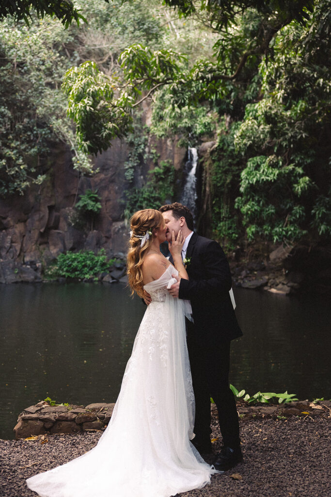 Some elopements feel like they were pulled straight out of a dream, and Courtnee and Joshua’s waterfall elopement in Kauai, Hawaii was exactly that. Surrounded by lush jungle, the sound of rushing water, and the soft island breeze, their day was intentional, intimate, and centered completely around the two of them.