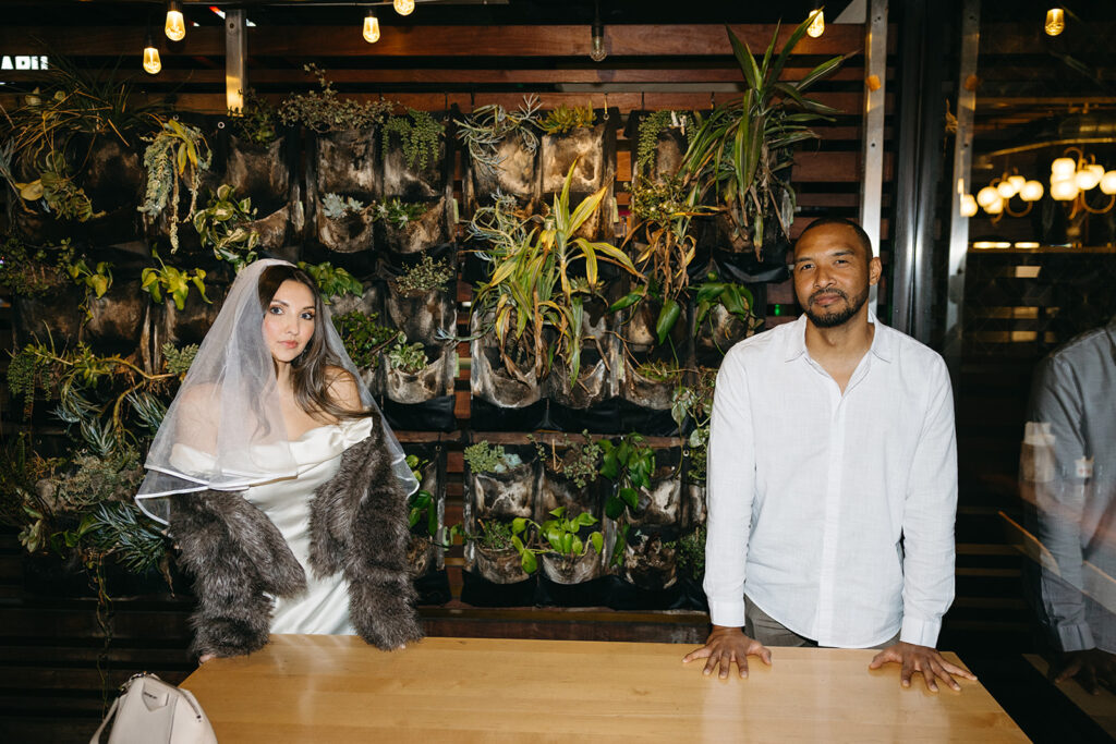 Katie and Karl’s late-night San Diego engagement session was absolutely the latter. These two showed up ready for fun, dressed to the nines, and totally embracing that after-dark, moody, editorial vibe that downtown does so well. It was fashion, flash, and pure personality—exactly what makes nighttime engagement photos so electric. 