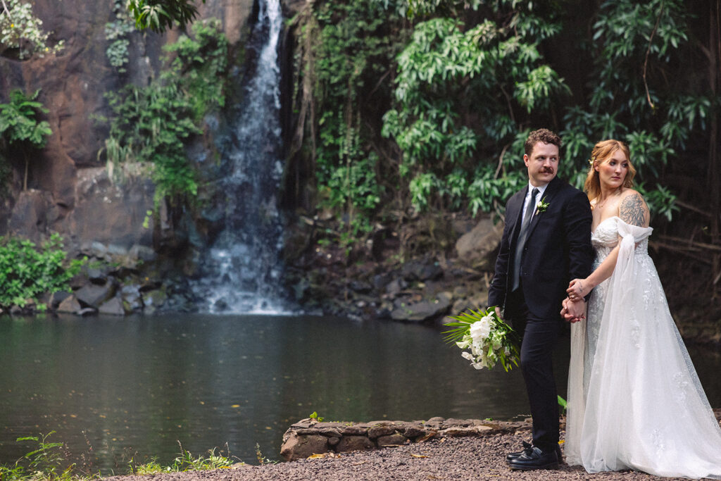 Some elopements feel like they were pulled straight out of a dream, and Courtnee and Joshua’s waterfall elopement in Kauai, Hawaii was exactly that. Surrounded by lush jungle, the sound of rushing water, and the soft island breeze, their day was intentional, intimate, and centered completely around the two of them.