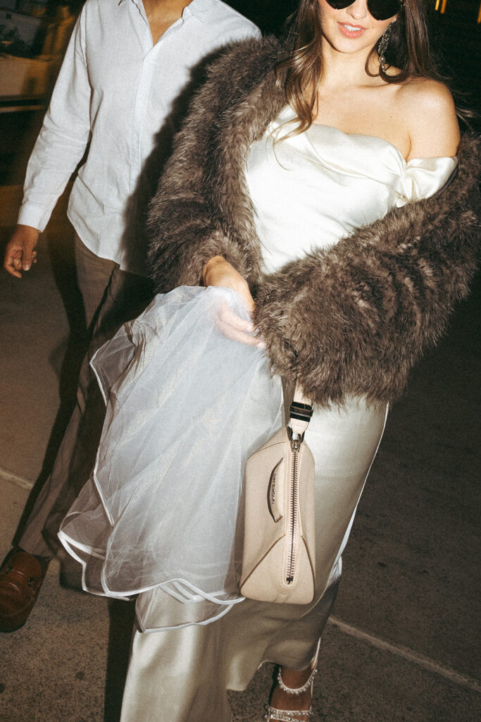 Katie and Karl’s late-night San Diego engagement session was absolutely the latter. These two showed up ready for fun, dressed to the nines, and totally embracing that after-dark, moody, editorial vibe that downtown does so well. It was fashion, flash, and pure personality—exactly what makes nighttime engagement photos so electric. 