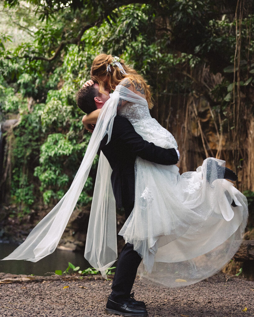 Some elopements feel like they were pulled straight out of a dream, and Courtnee and Joshua’s waterfall elopement in Kauai, Hawaii was exactly that. Surrounded by lush jungle, the sound of rushing water, and the soft island breeze, their day was intentional, intimate, and centered completely around the two of them.