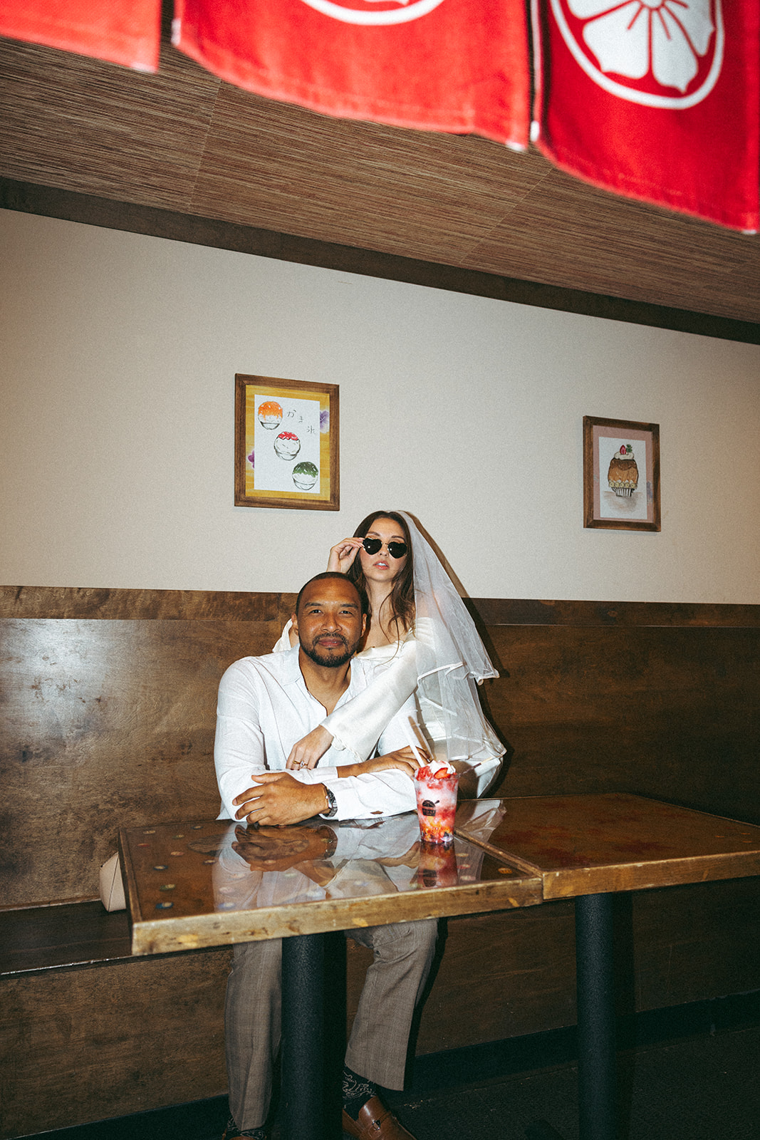 Katie and Karl’s late-night San Diego engagement session was absolutely the latter. These two showed up ready for fun, dressed to the nines, and totally embracing that after-dark, moody, editorial vibe that downtown does so well. It was fashion, flash, and pure personality—exactly what makes nighttime engagement photos so electric. 