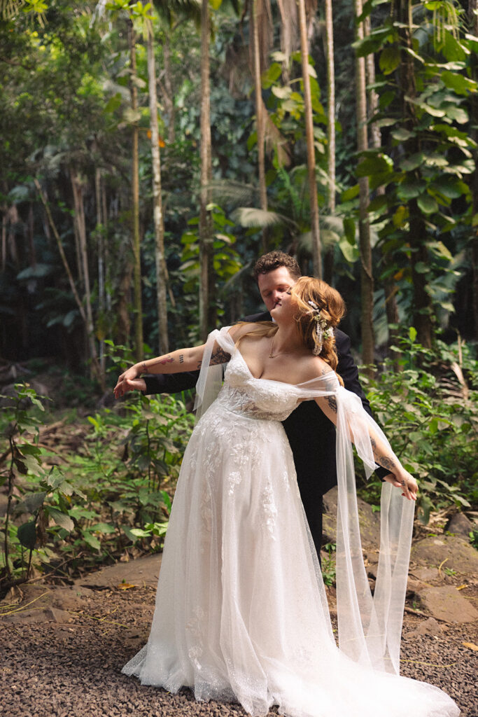 Some elopements feel like they were pulled straight out of a dream, and Courtnee and Joshua’s waterfall elopement in Kauai, Hawaii was exactly that. Surrounded by lush jungle, the sound of rushing water, and the soft island breeze, their day was intentional, intimate, and centered completely around the two of them.