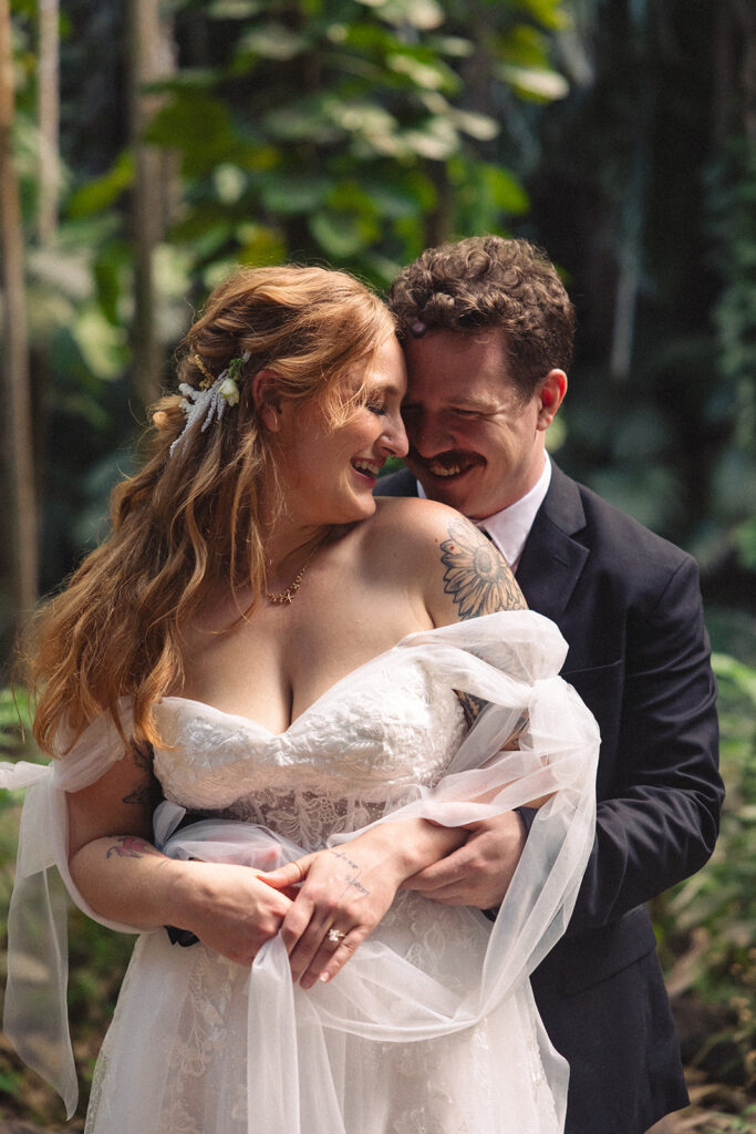 Some elopements feel like they were pulled straight out of a dream, and Courtnee and Joshua’s waterfall elopement in Kauai, Hawaii was exactly that. Surrounded by lush jungle, the sound of rushing water, and the soft island breeze, their day was intentional, intimate, and centered completely around the two of them.