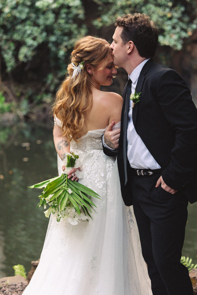 Some elopements feel like they were pulled straight out of a dream, and Courtnee and Joshua’s waterfall elopement in Kauai, Hawaii was exactly that. Surrounded by lush jungle, the sound of rushing water, and the soft island breeze, their day was intentional, intimate, and centered completely around the two of them.