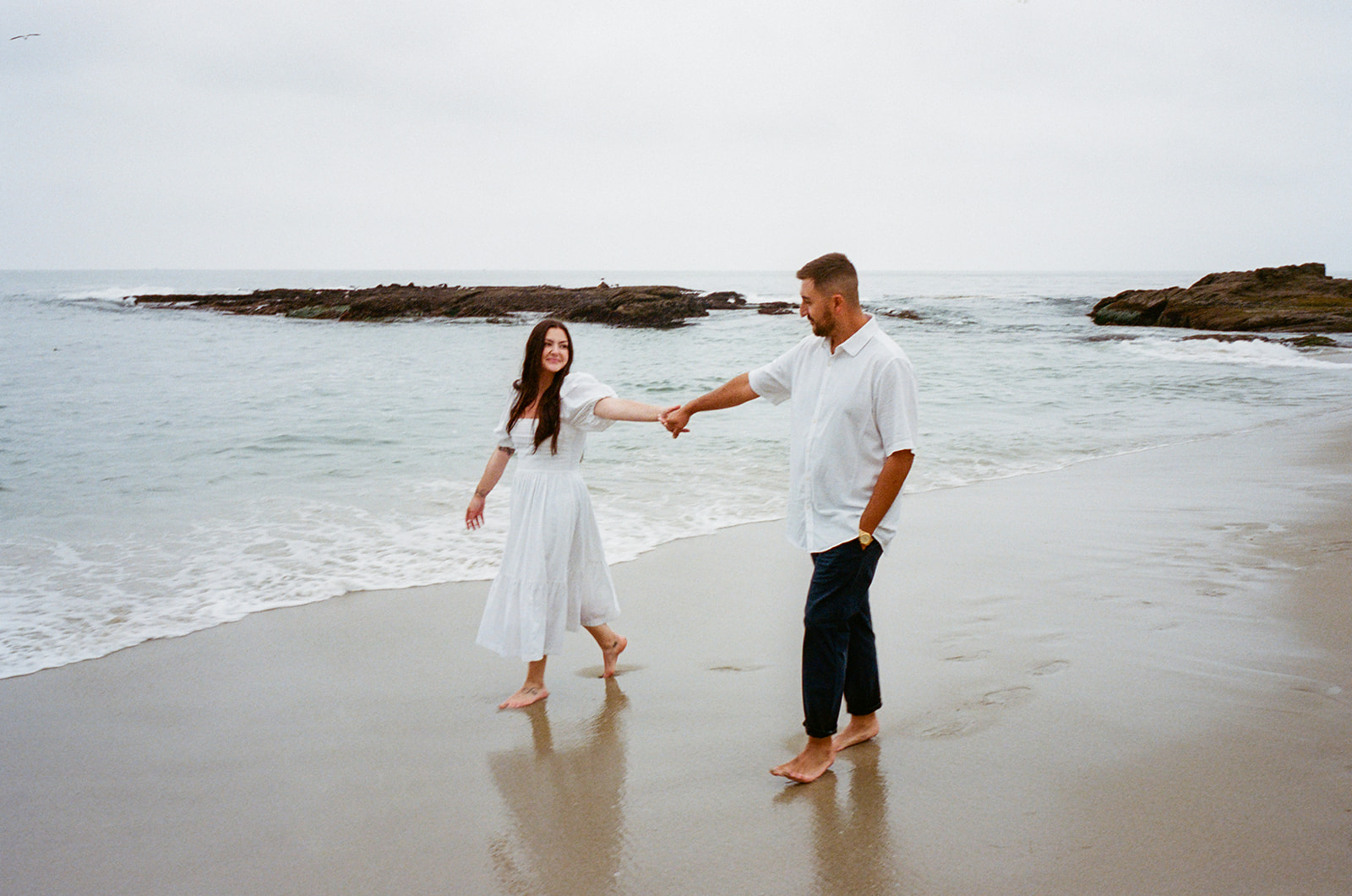 This Orange County engagement session blends vintage car style with relaxed Southern California beach vibes. Shot on both digital and 35mm film, this gallery is full of inspiration from Tia Leigh Photography for couples looking for a San Diego or Southern California engagement photographer who creates a mix of editorial, romantic, and candid images.