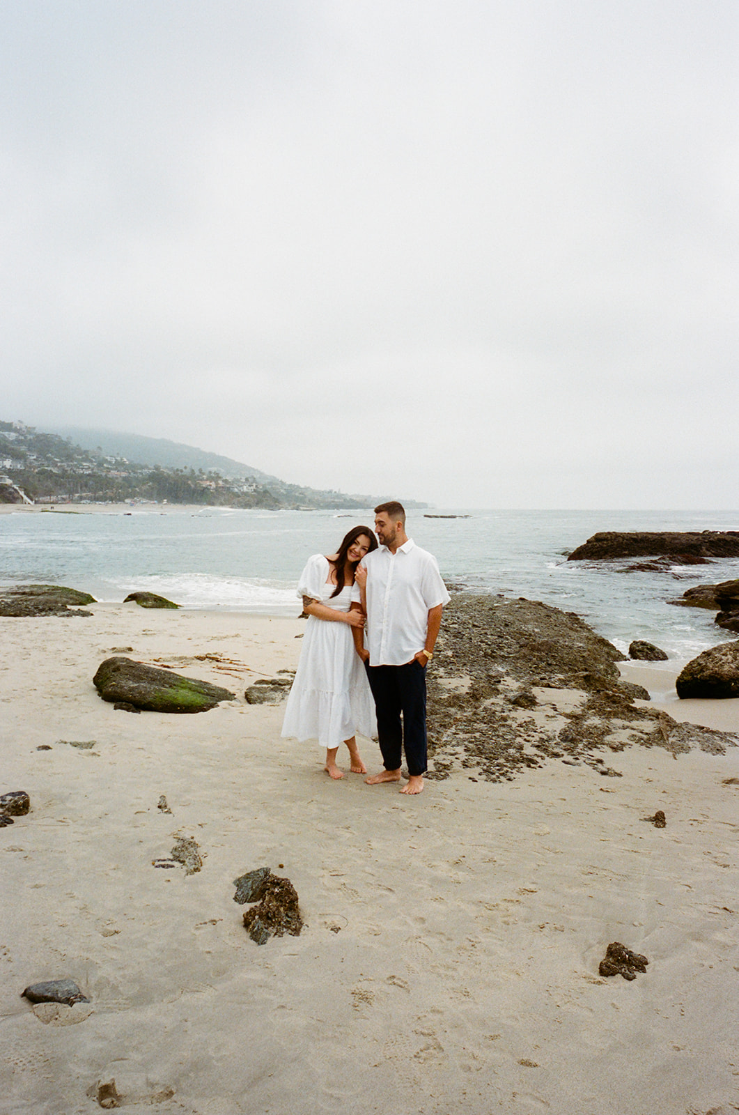 This Orange County engagement session blends vintage car style with relaxed Southern California beach vibes. Shot on both digital and 35mm film, this gallery is full of inspiration from Tia Leigh Photography for couples looking for a San Diego or Southern California engagement photographer who creates a mix of editorial, romantic, and candid images.