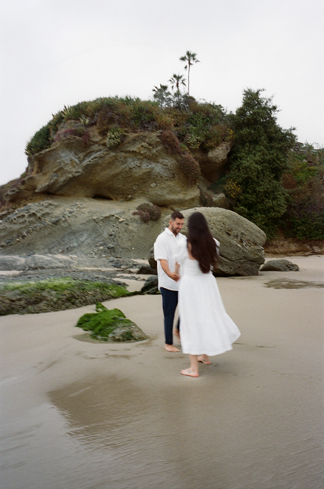 This Orange County engagement session blends vintage car style with relaxed Southern California beach vibes. Shot on both digital and 35mm film, this gallery is full of inspiration from Tia Leigh Photography for couples looking for a San Diego or Southern California engagement photographer who creates a mix of editorial, romantic, and candid images.