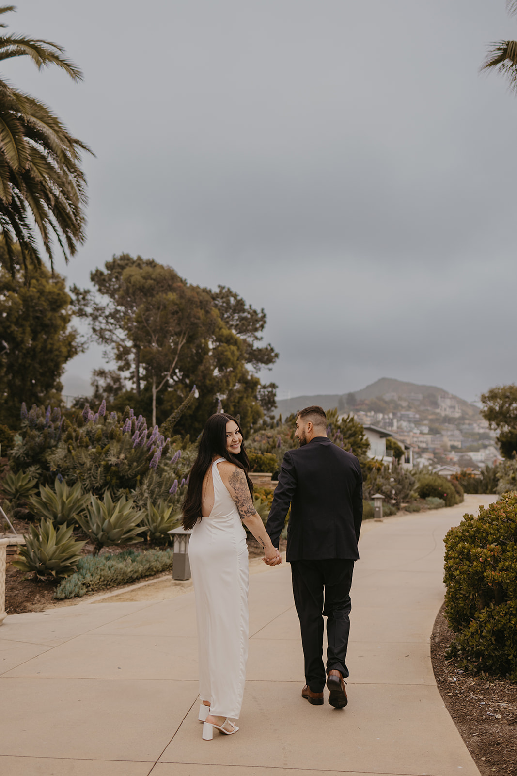 This Orange County engagement session blends vintage car style with relaxed Southern California beach vibes. Shot on both digital and 35mm film, this gallery is full of inspiration from Tia Leigh Photography for couples looking for a San Diego or Southern California engagement photographer who creates a mix of editorial, romantic, and candid images.