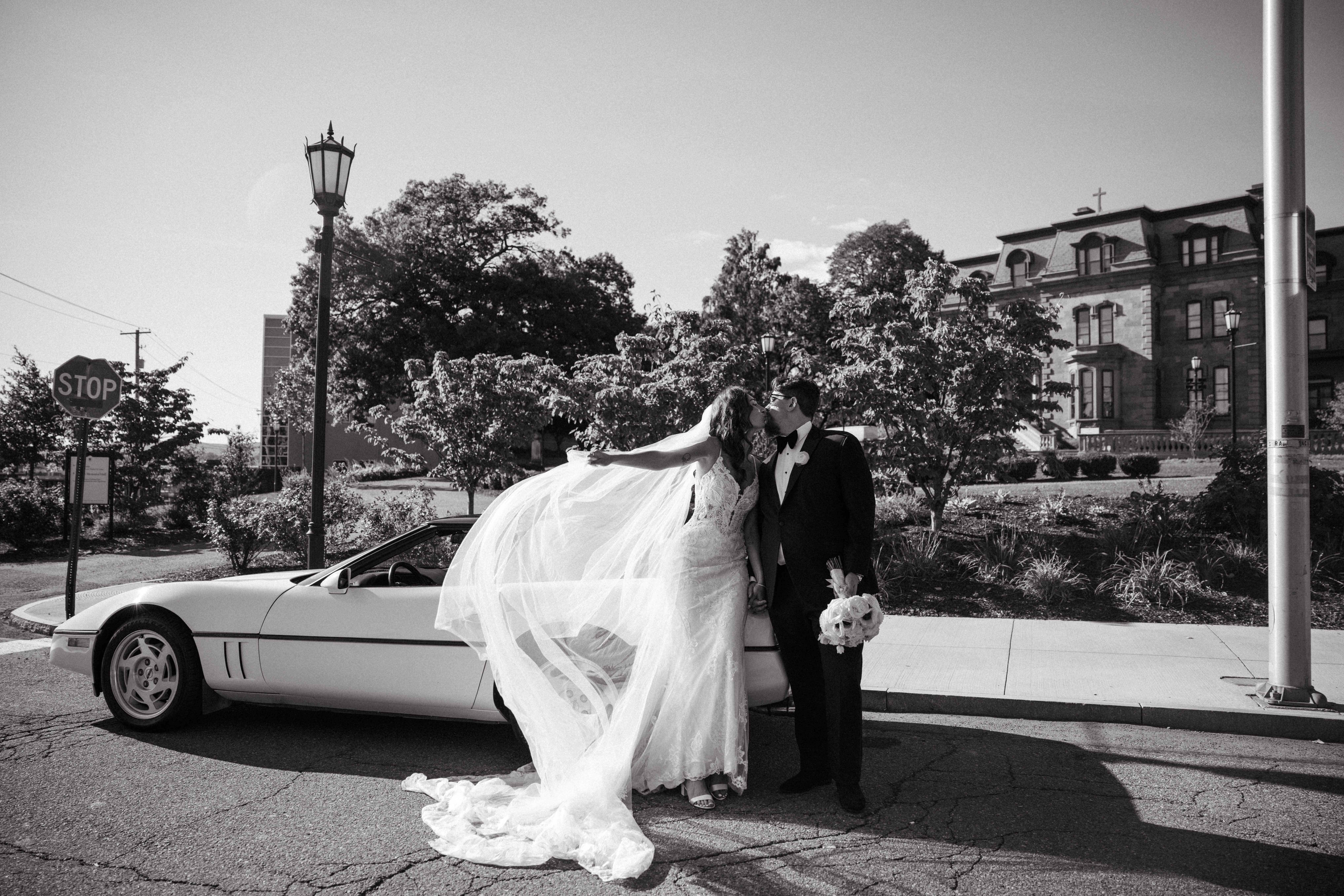Bride in Dress Lounge gown with moody, romantic Scranton Cultural Center backdrop