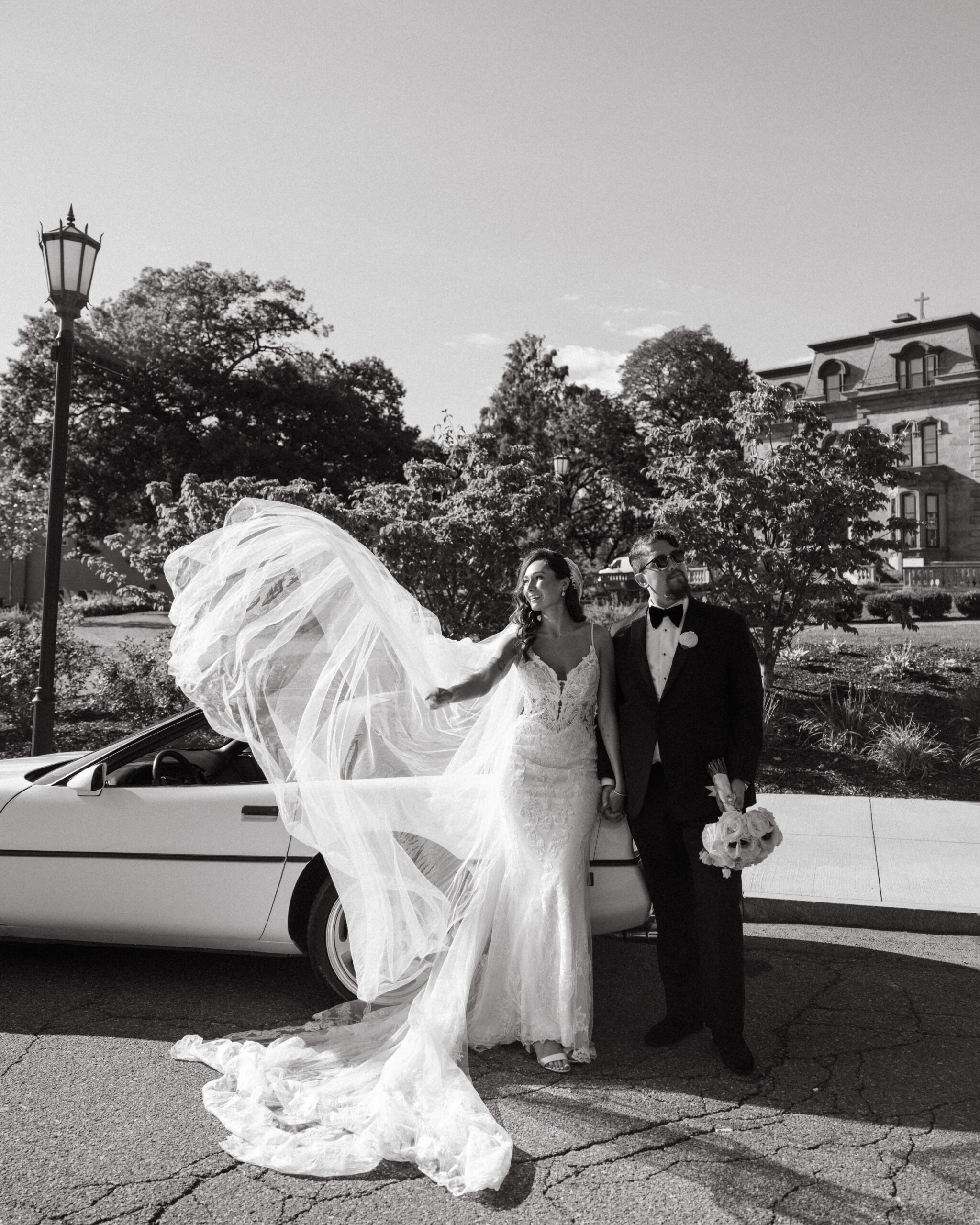 Bride in Dress Lounge gown with moody, romantic Scranton Cultural Center backdrop