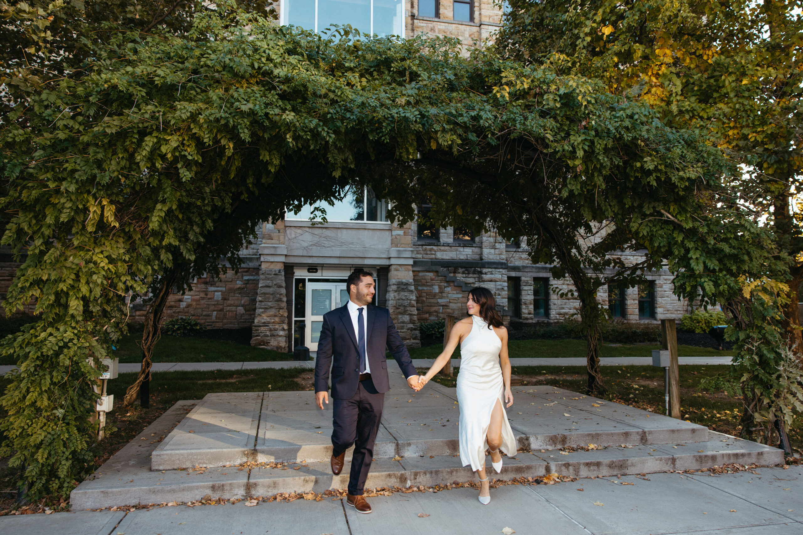 Engagement photos in Scranton, PA featuring city architecture and downtown vibes