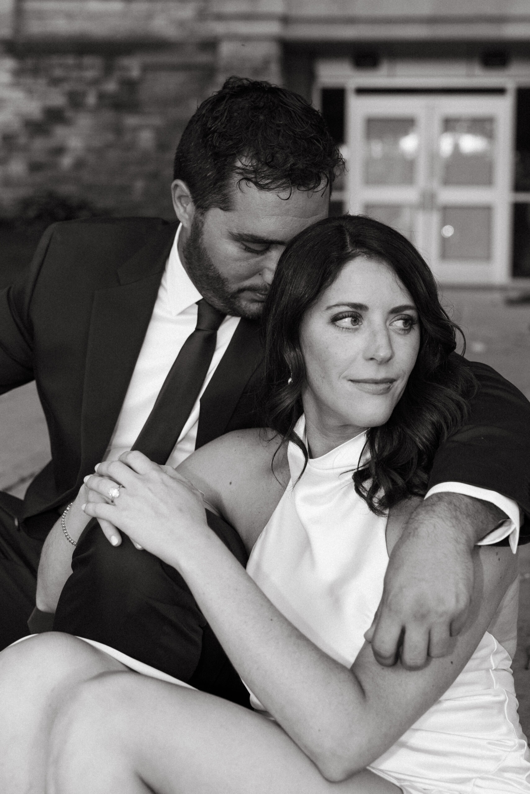 Engagement photos in Scranton, PA featuring city architecture and downtown vibes