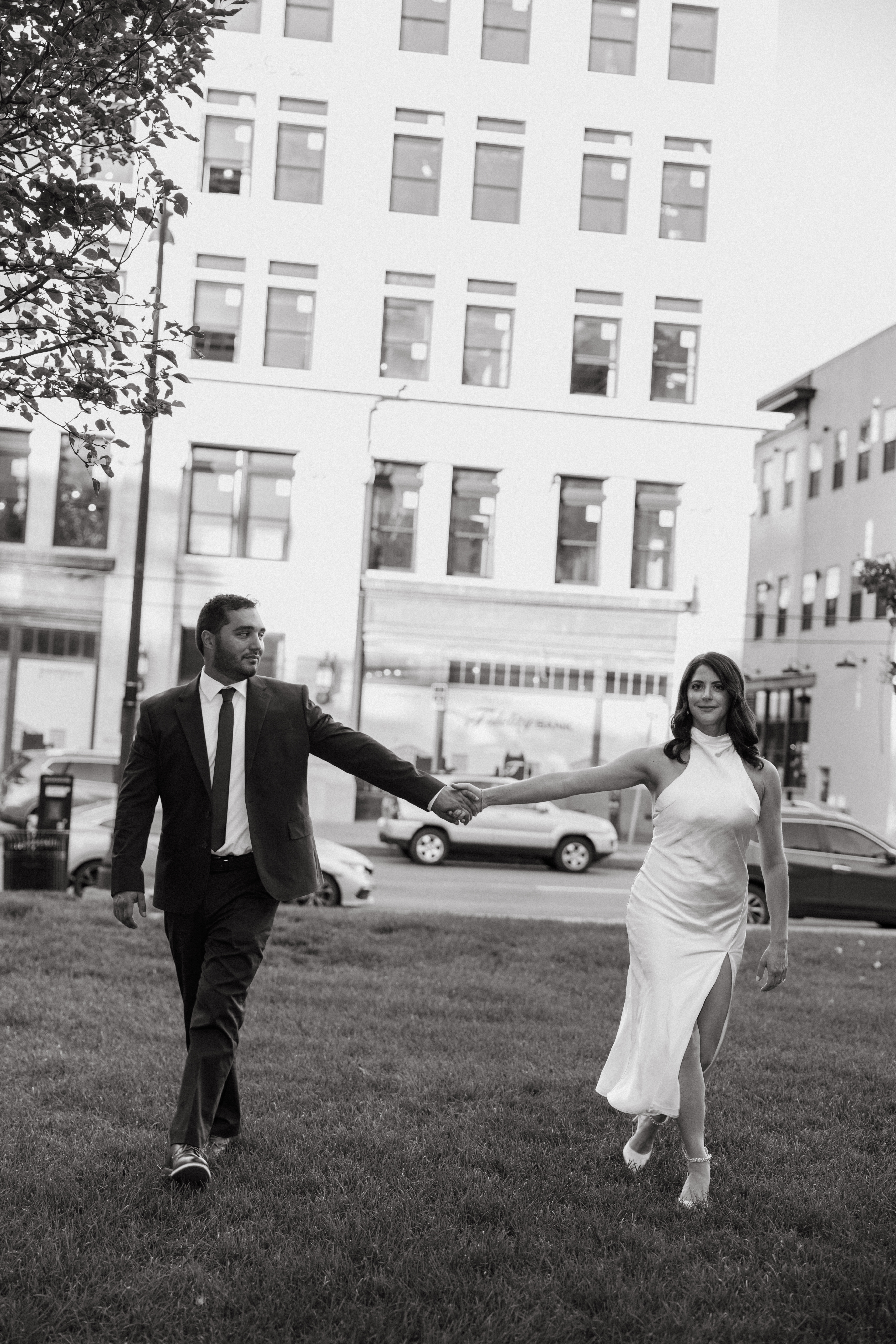 Engagement photos in Scranton, PA featuring city architecture and downtown vibes