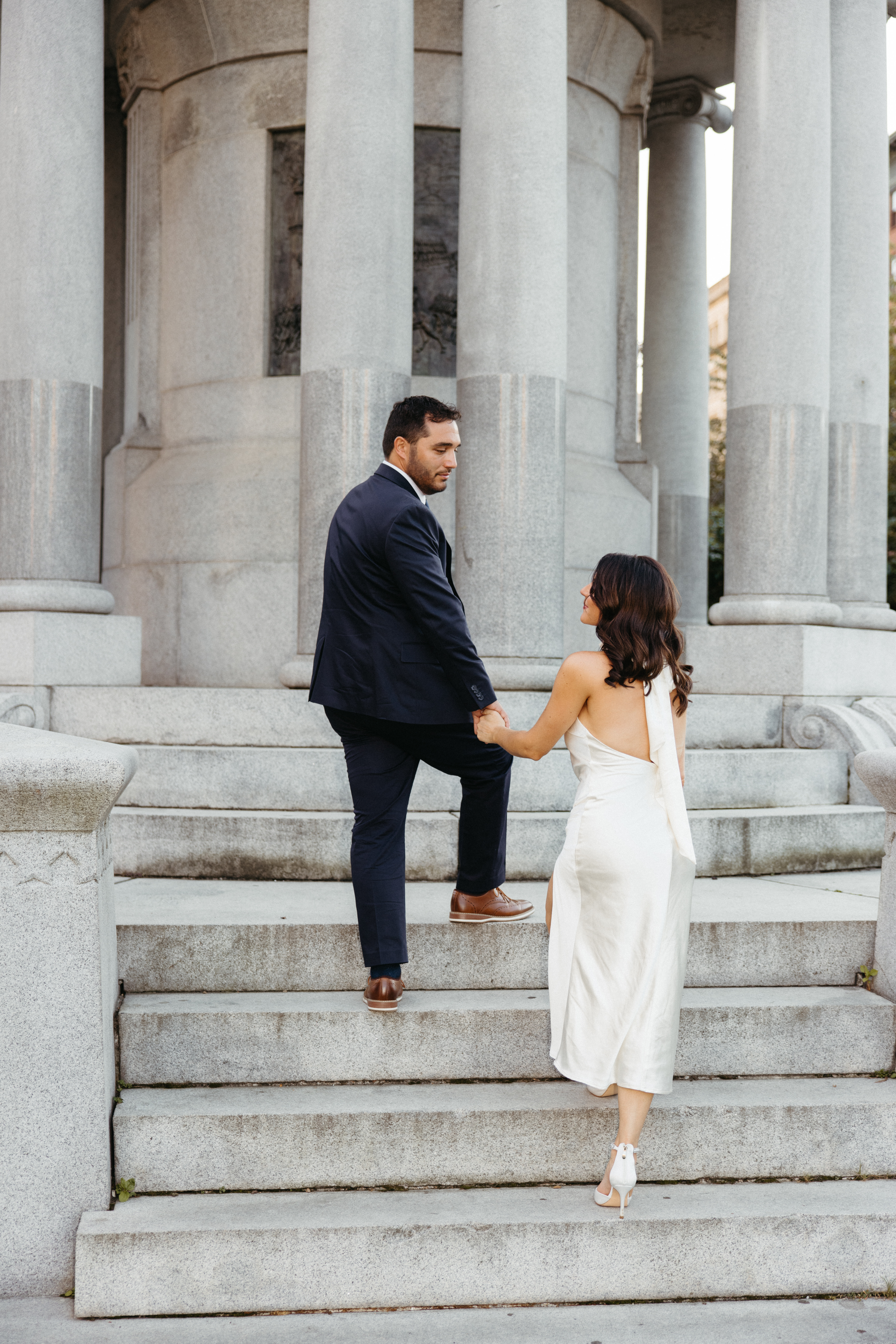 Engagement photos in Scranton, PA featuring city architecture and downtown vibes