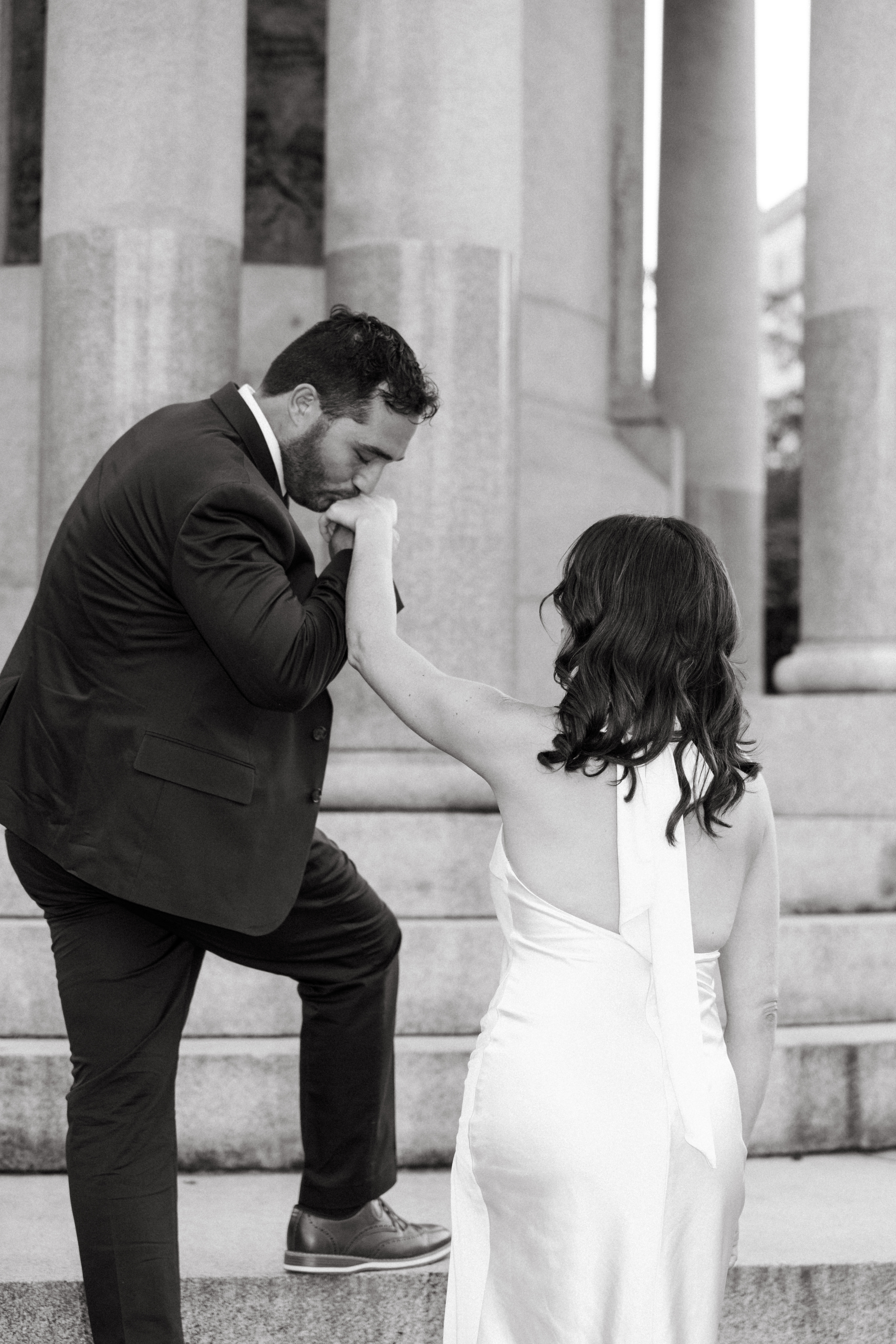 Engagement photos in Scranton, PA featuring city architecture and downtown vibes