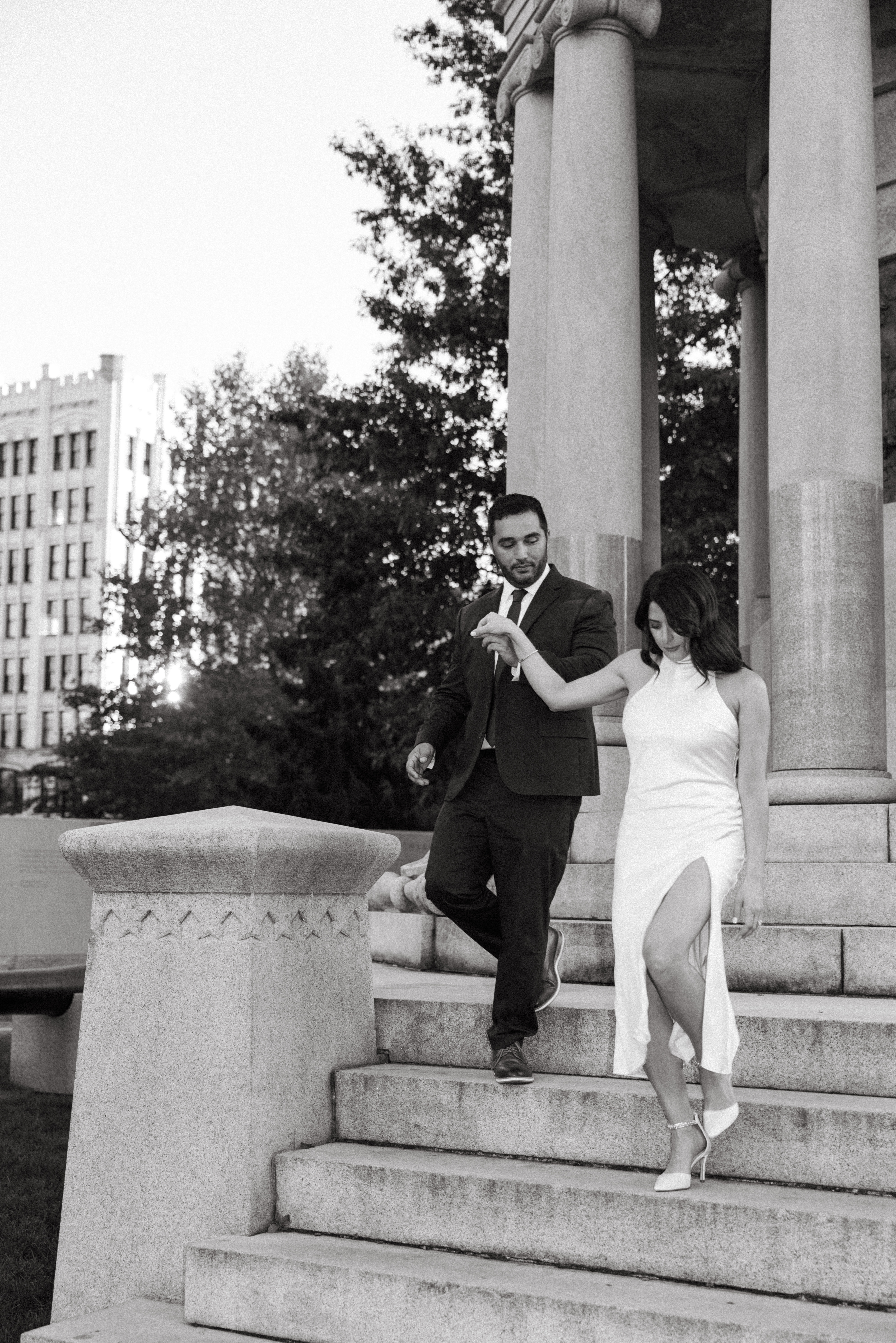Engagement photos in Scranton, PA featuring city architecture and downtown vibes