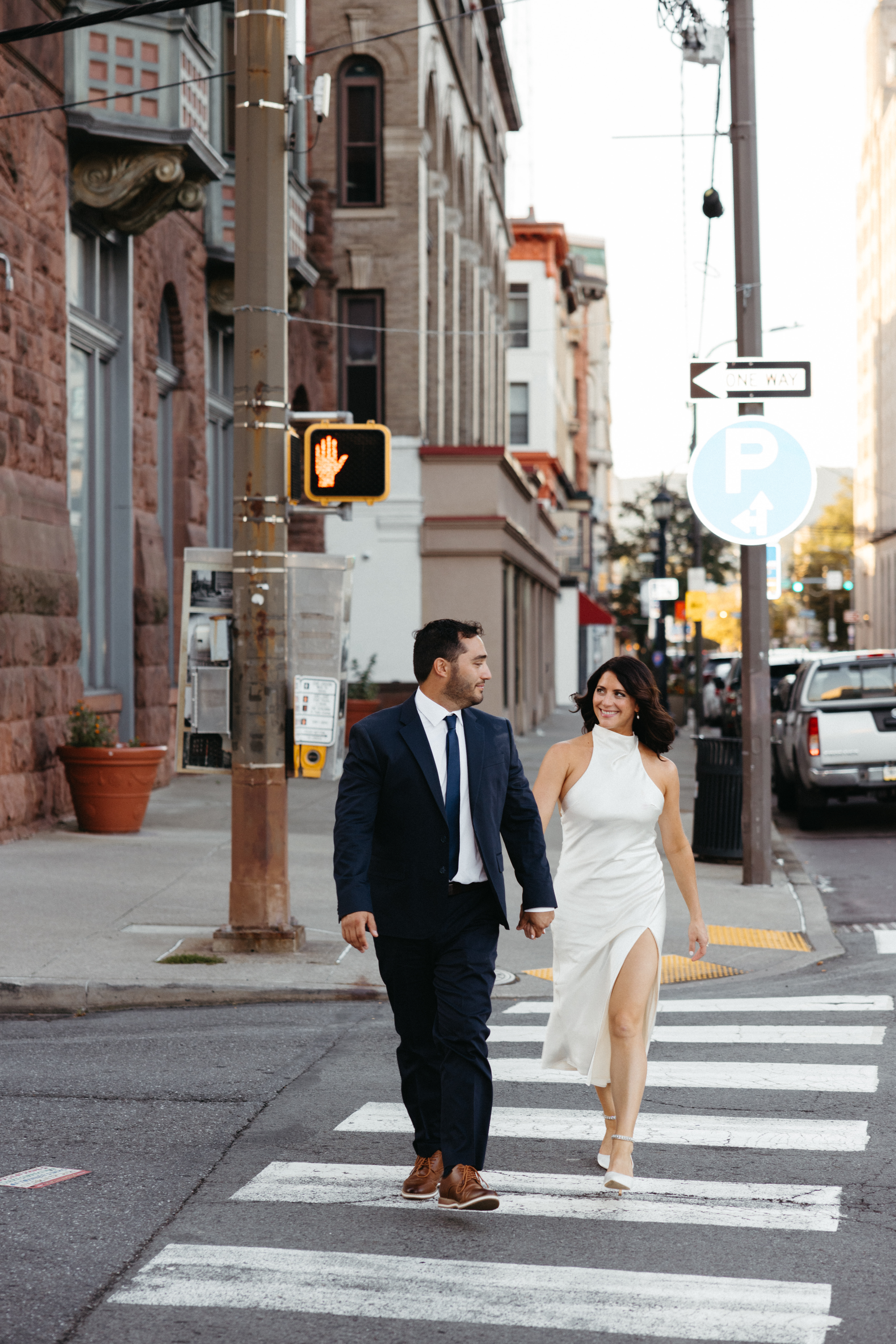 Engagement photos in Scranton, PA featuring city architecture and downtown vibes
