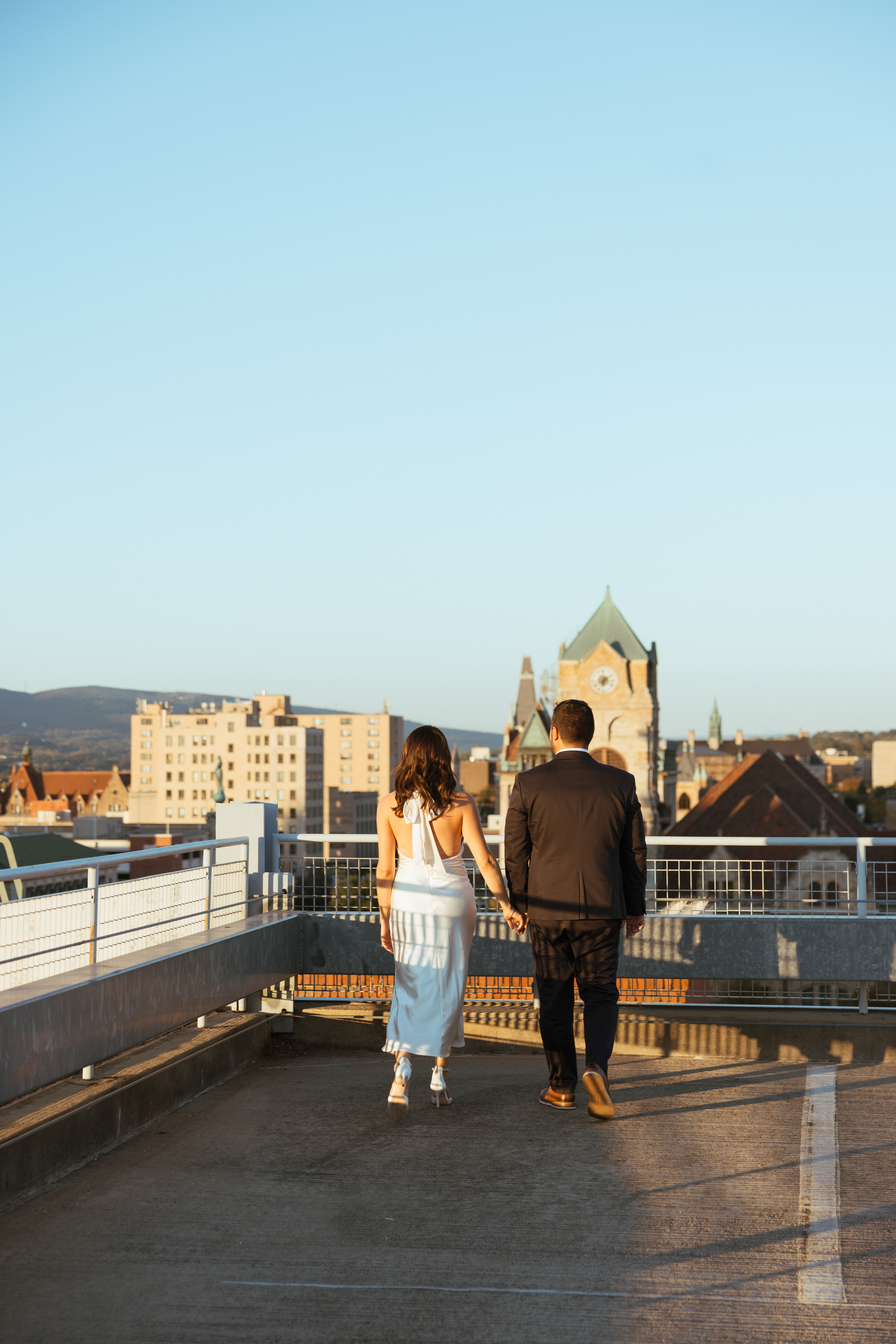 Downtown Scranton rooftop engagement session with soft sunset light