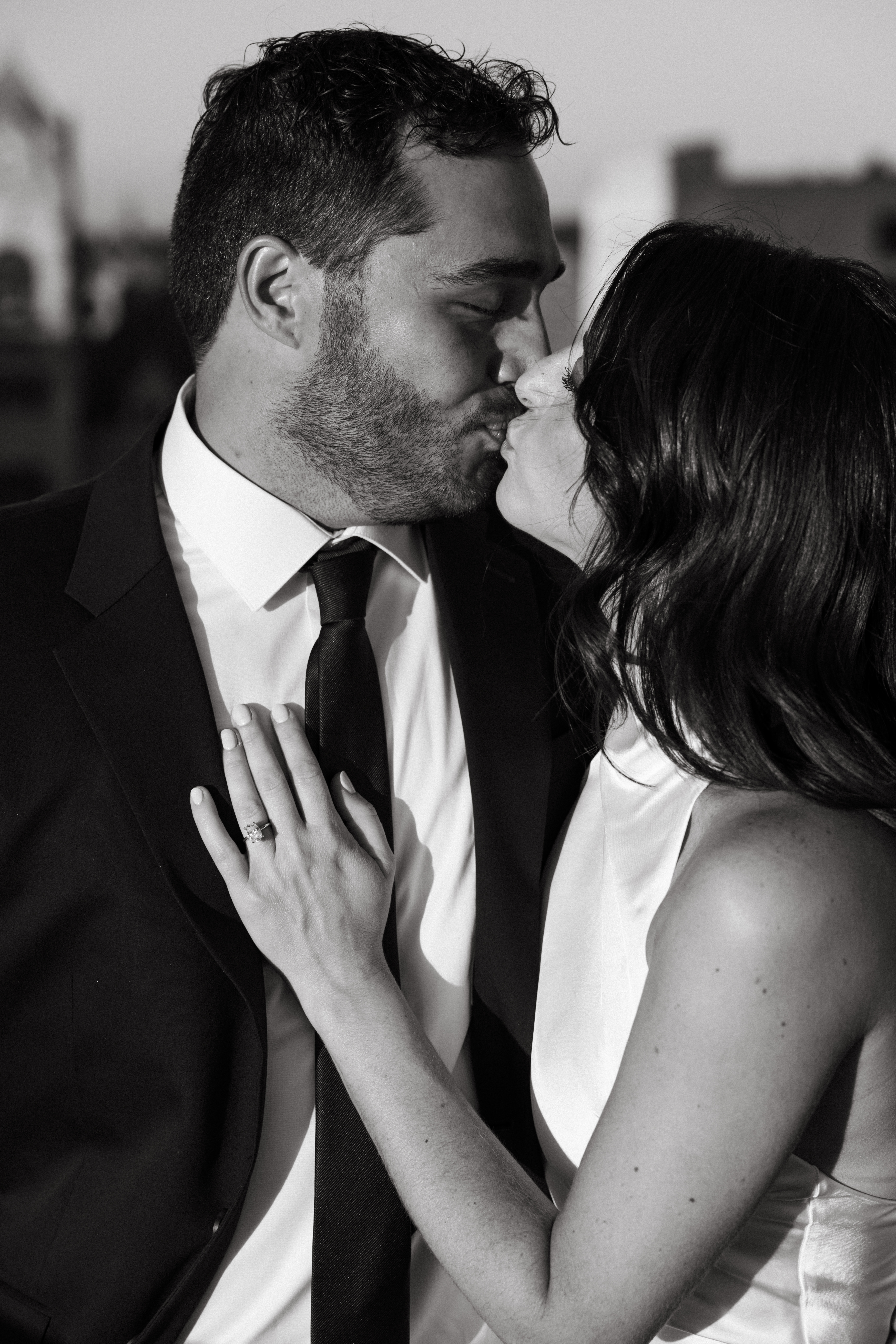 Downtown Scranton rooftop engagement session with soft sunset light