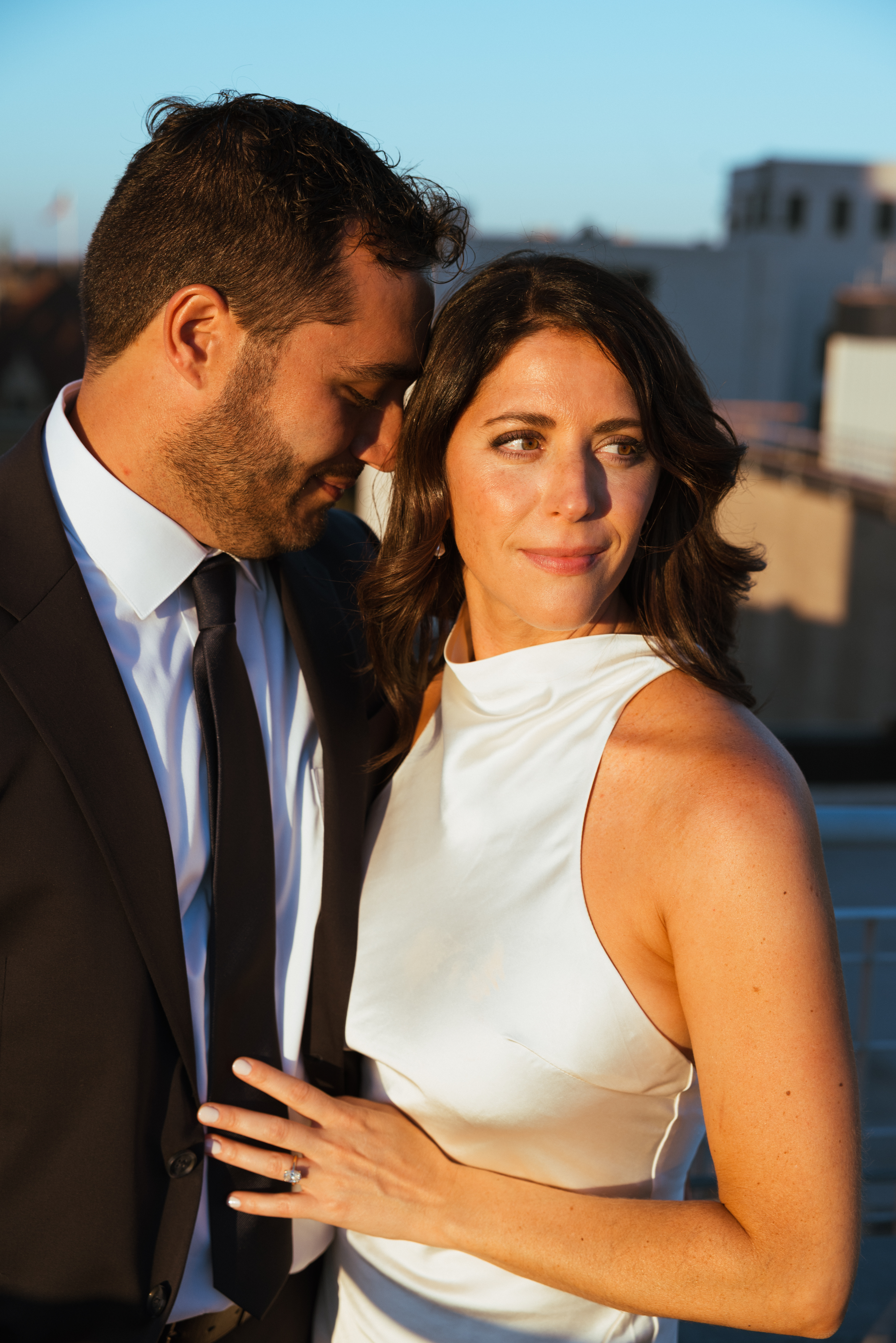 Downtown Scranton rooftop engagement session with soft sunset light