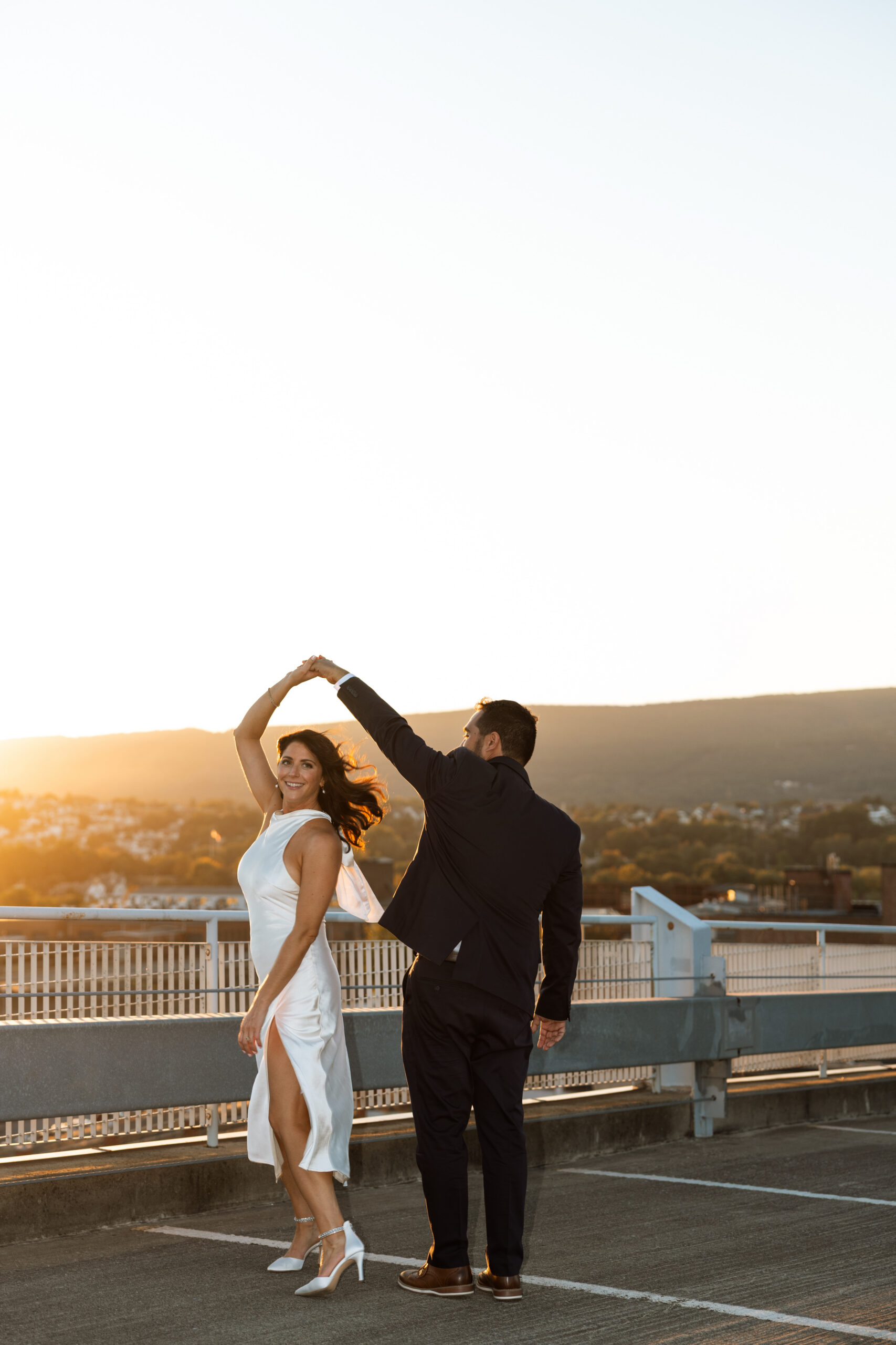 Downtown Scranton rooftop engagement session with soft sunset light