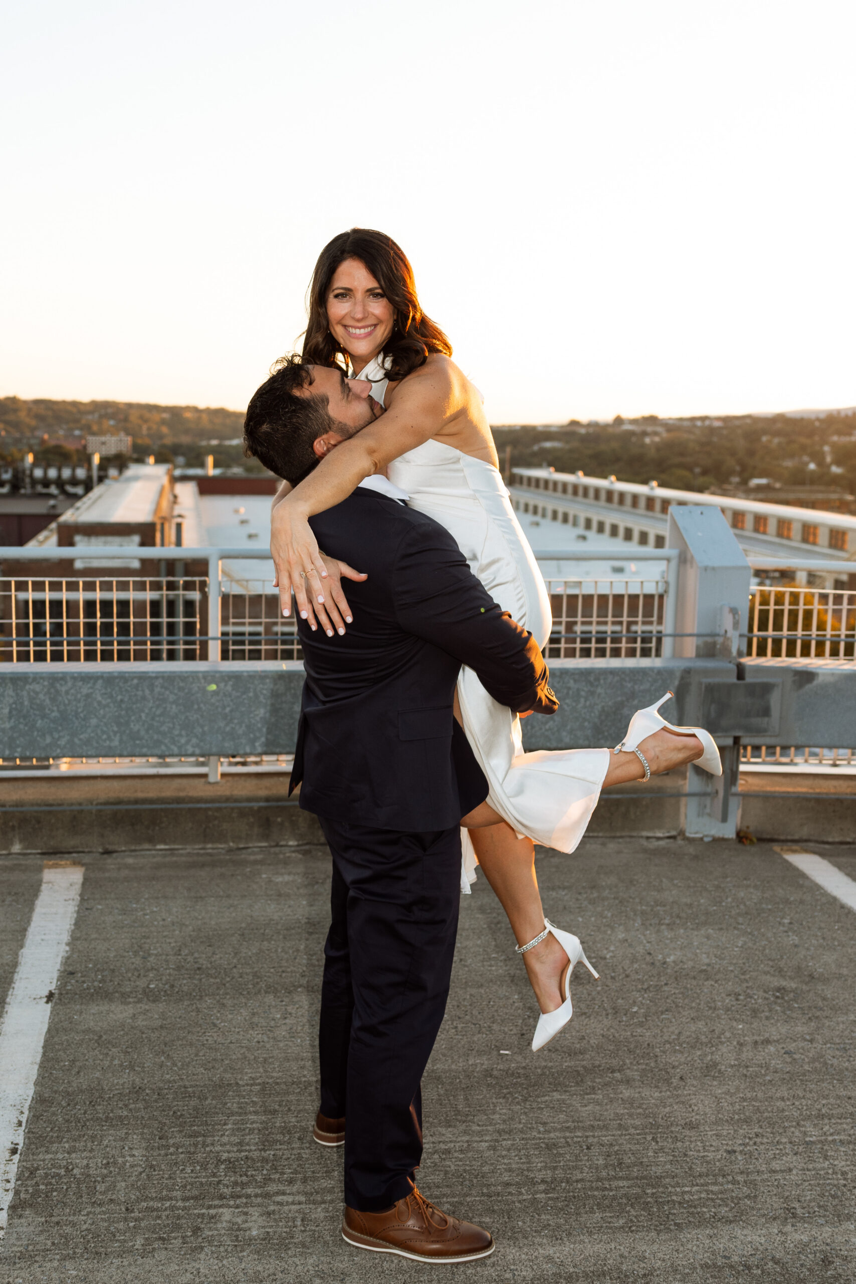 Downtown Scranton rooftop engagement session with soft sunset light