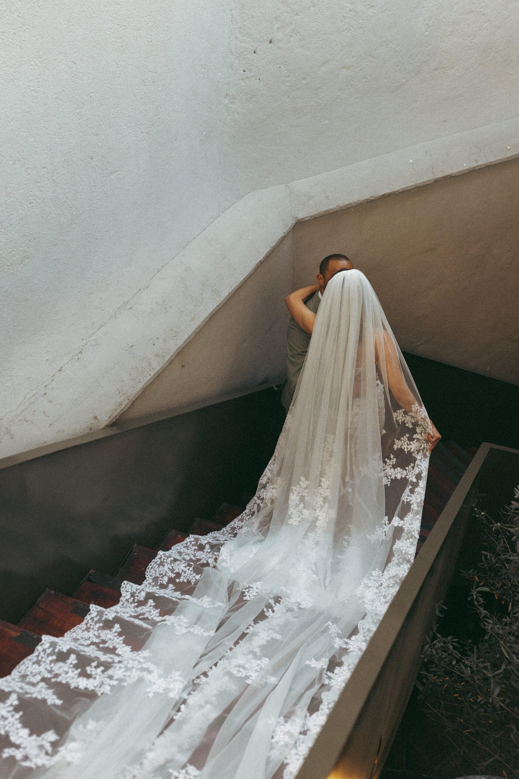 Couple walking through San Miguel de Allende just after getting married