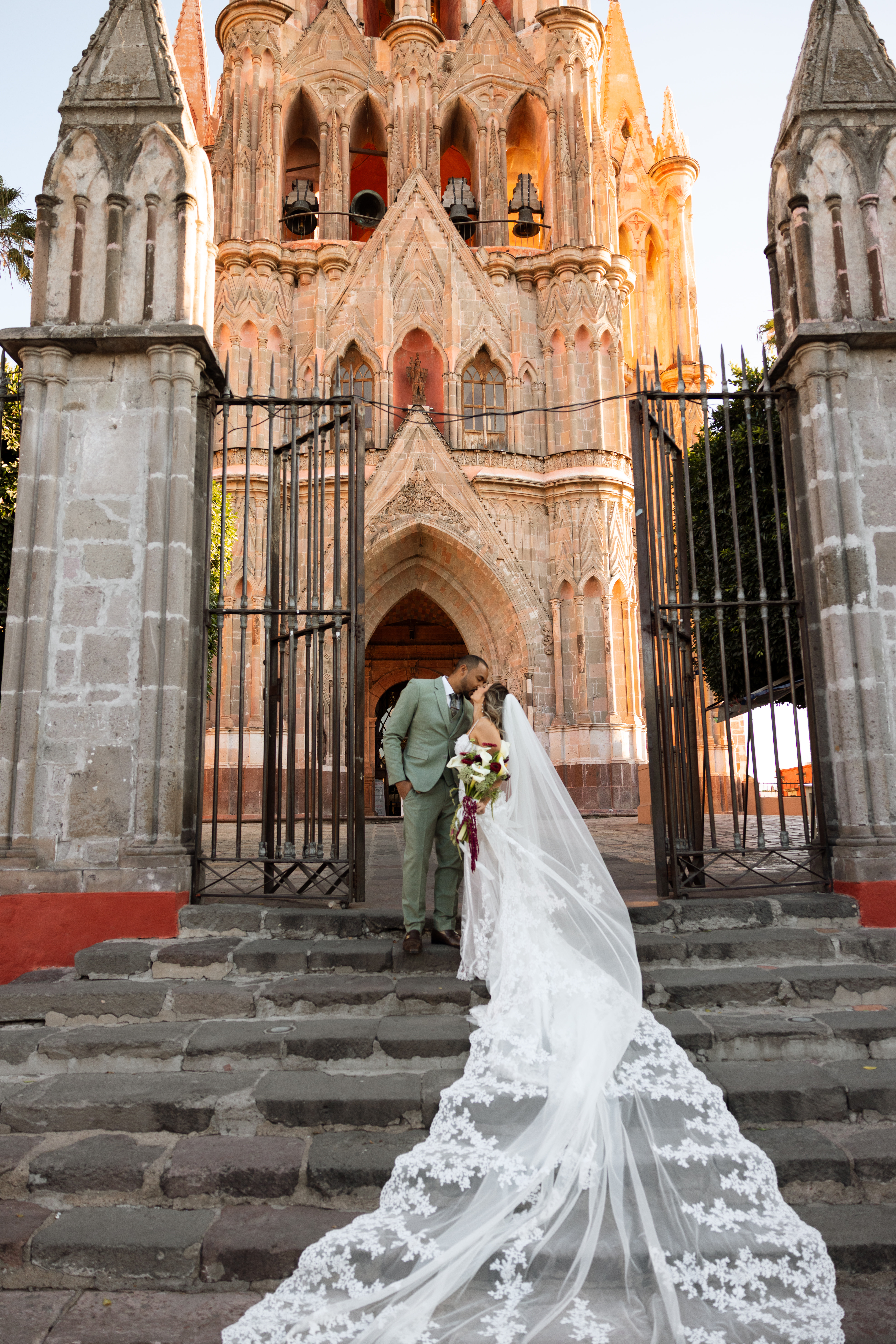Couple walking through San Miguel de Allende just after getting married