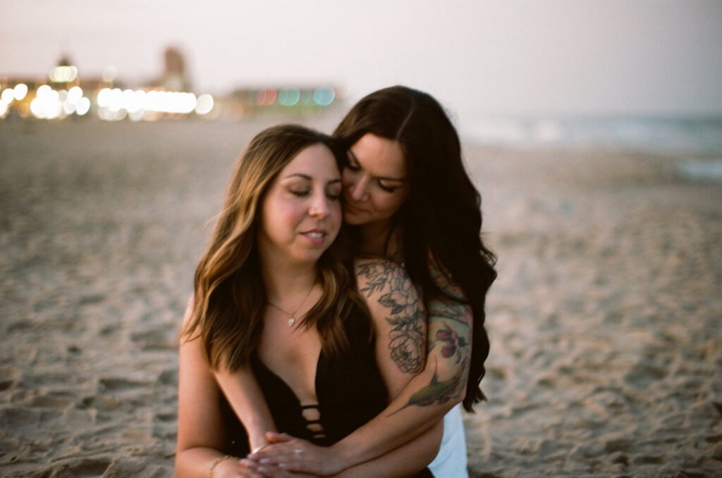 35mm film engagement photos with nostalgic beach tones in Asbury Park