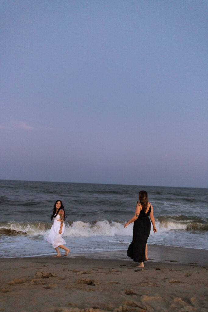Blue hour engagement session with moody ocean backdrop in Asbury Park, NJ