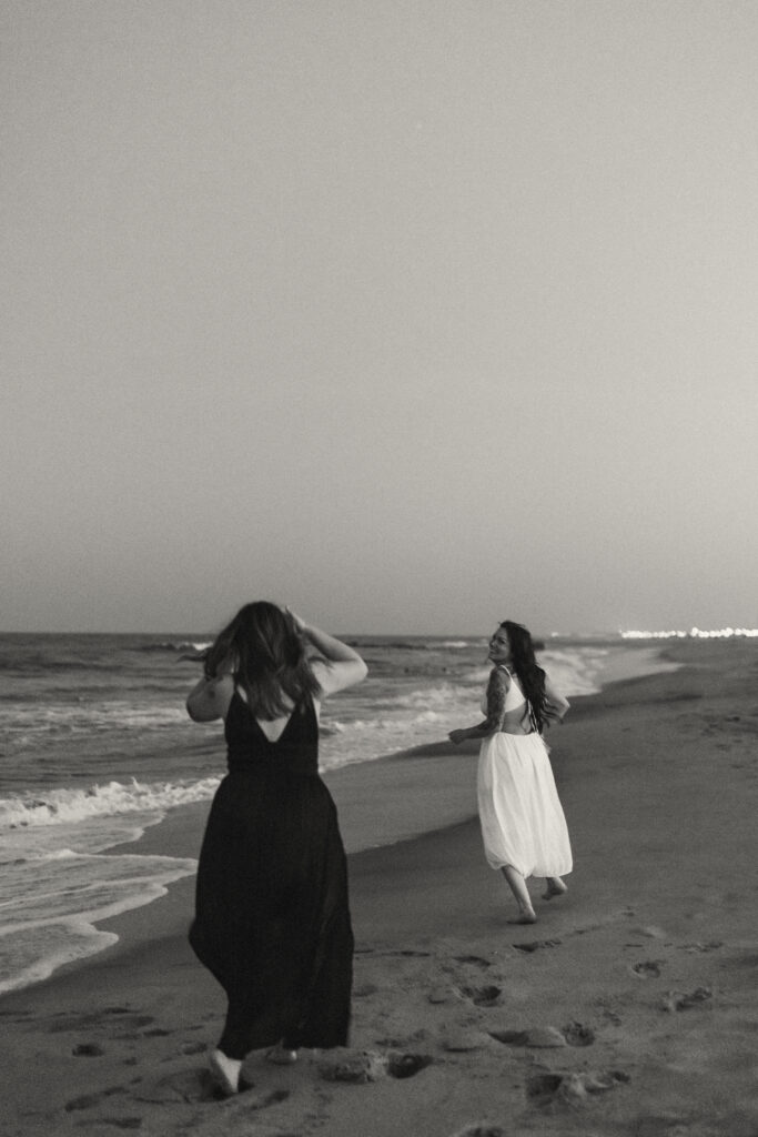 Blue hour engagement session with moody ocean backdrop in Asbury Park, NJ