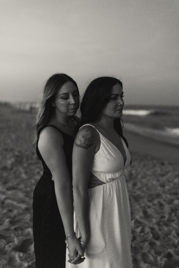 Blue hour engagement session with moody ocean backdrop in Asbury Park, NJ