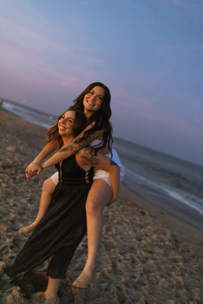 Blue hour engagement session with moody ocean backdrop in Asbury Park, NJ