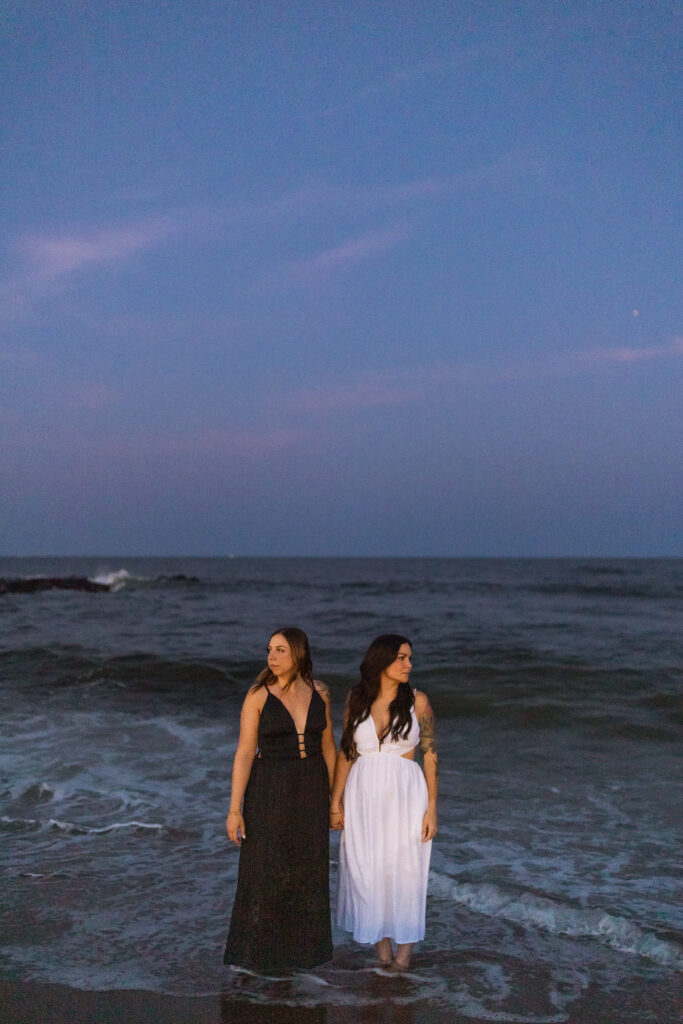 Blue hour engagement session with moody ocean backdrop in Asbury Park, NJ