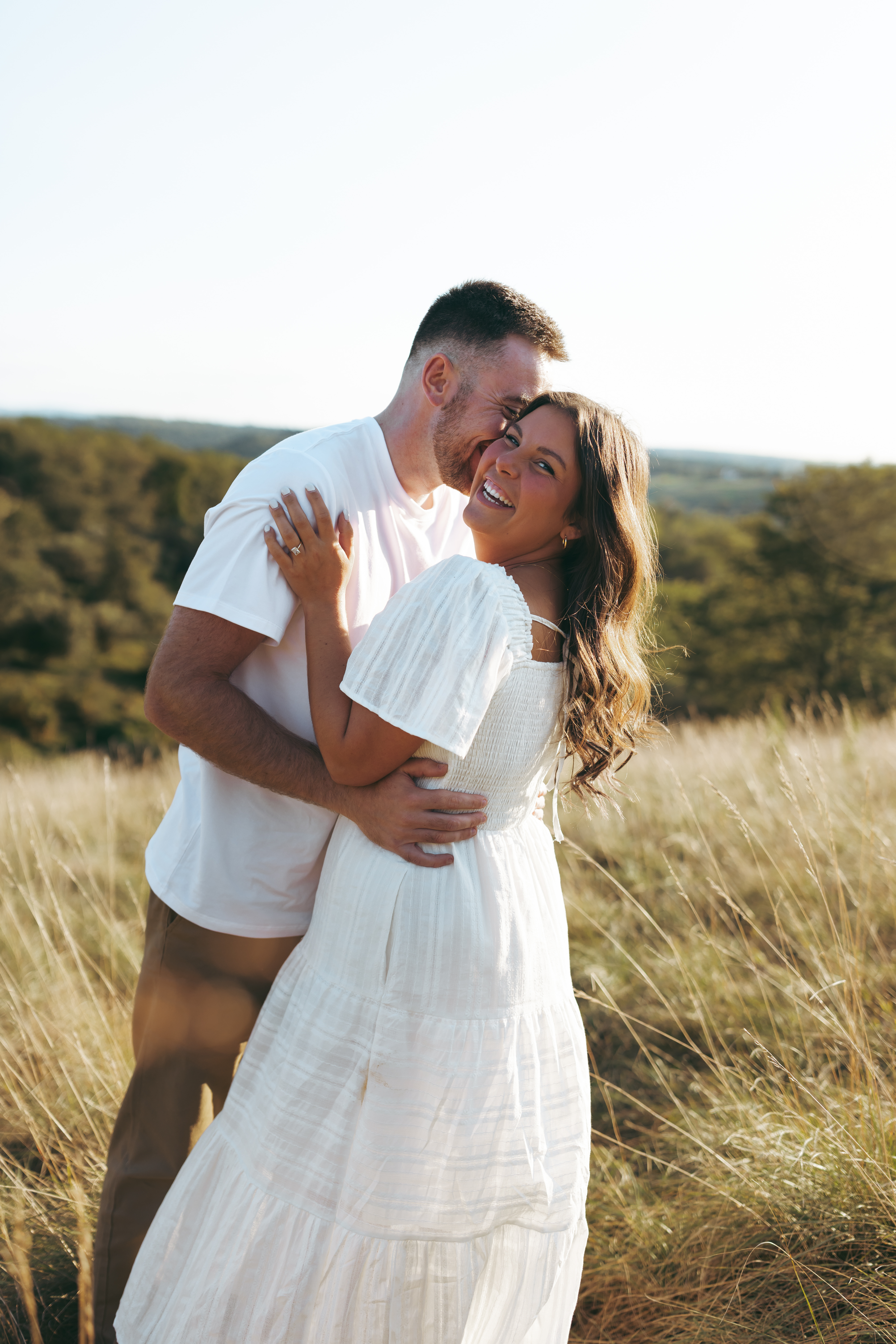 Natural, candid field couple photos created through guided prompts in Lehigh Valley Pennsylvania at golden hour