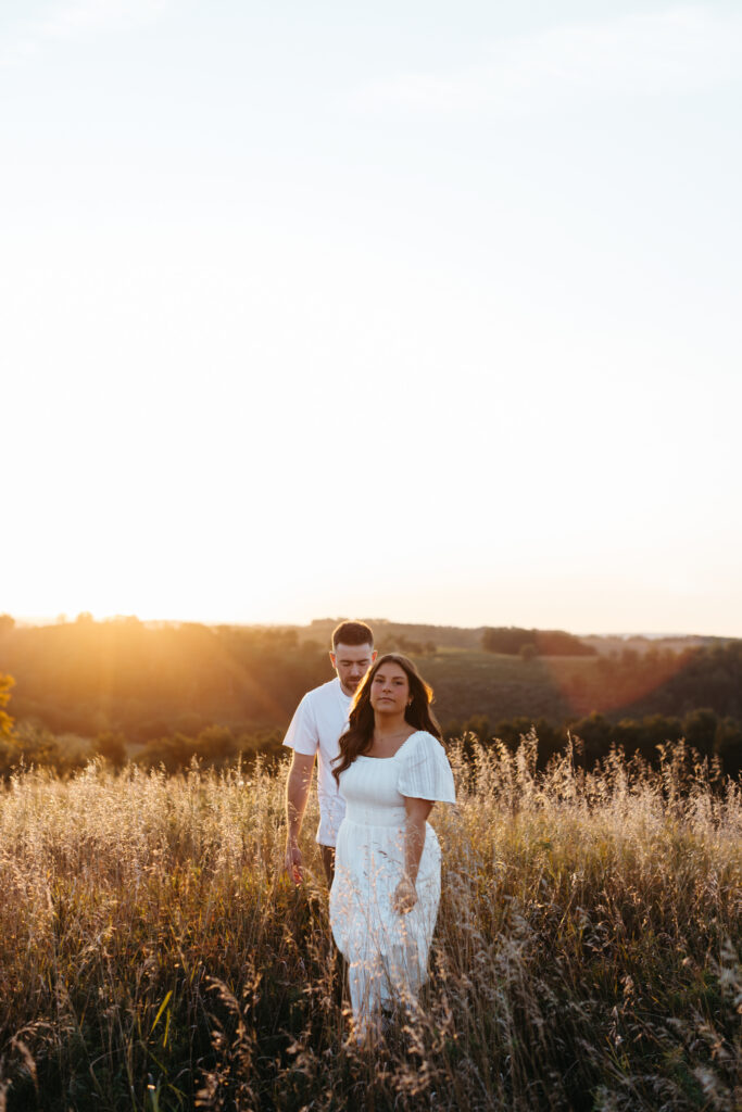 Natural, candid field couple photos created through guided prompts in Lehigh Valley Pennsylvania at golden hour