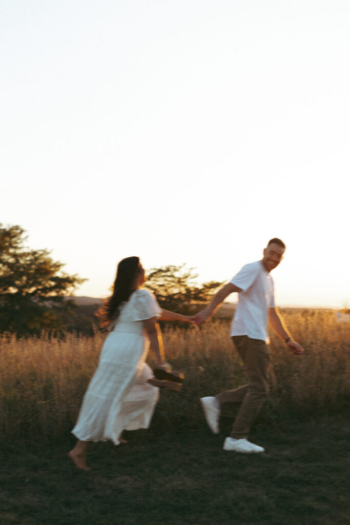 Natural, candid field couple photos created through guided prompts in Lehigh Valley Pennsylvania at golden hour