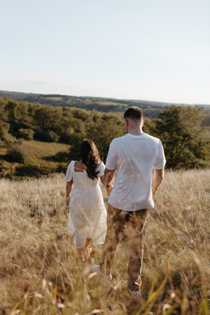 Natural, candid field couple photos created through guided prompts in Lehigh Valley Pennsylvania at golden hour