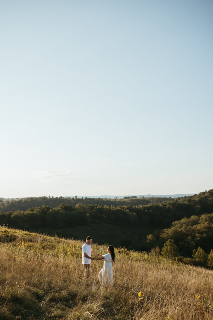 Natural, candid field couple photos created through guided prompts in Lehigh Valley Pennsylvania at golden hour