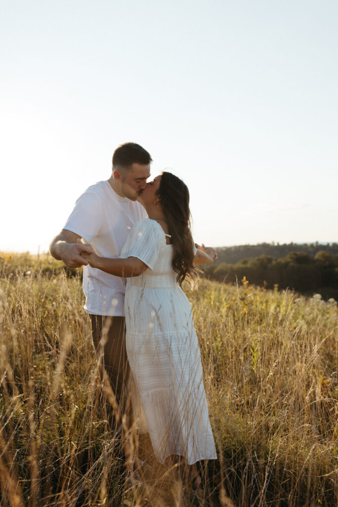 Natural, candid field couple photos created through guided prompts in Lehigh Valley Pennsylvania at golden hour
