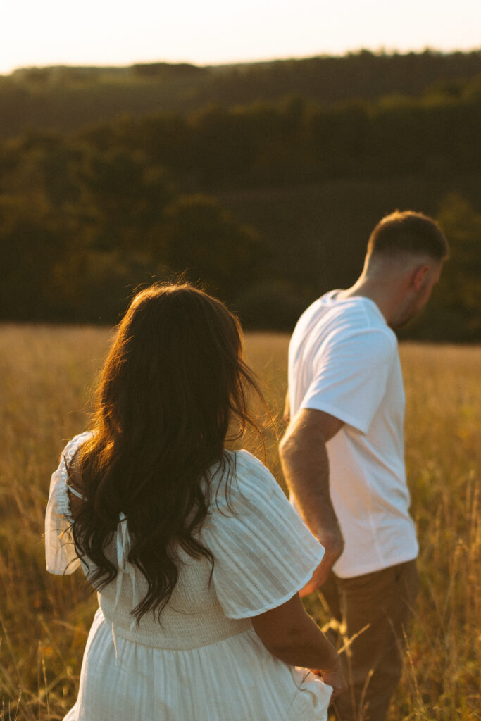 Natural, candid field couple photos created through guided prompts in Lehigh Valley Pennsylvania at golden hour